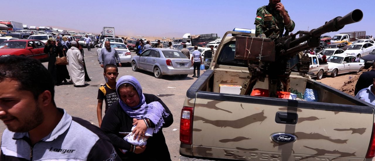 Irakische Familien flüchten aus der Provinz Ninawa. Foto: AFP | Safin Hamed