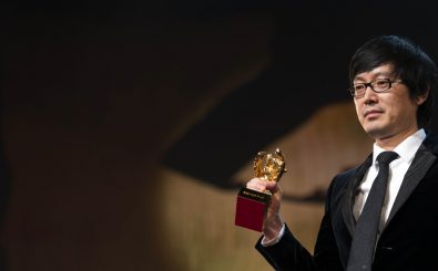 Regisseur Diao Yinan auf der Berlinale mit dem Goldenen Bären. Foto: Johannes Eisele | AFP