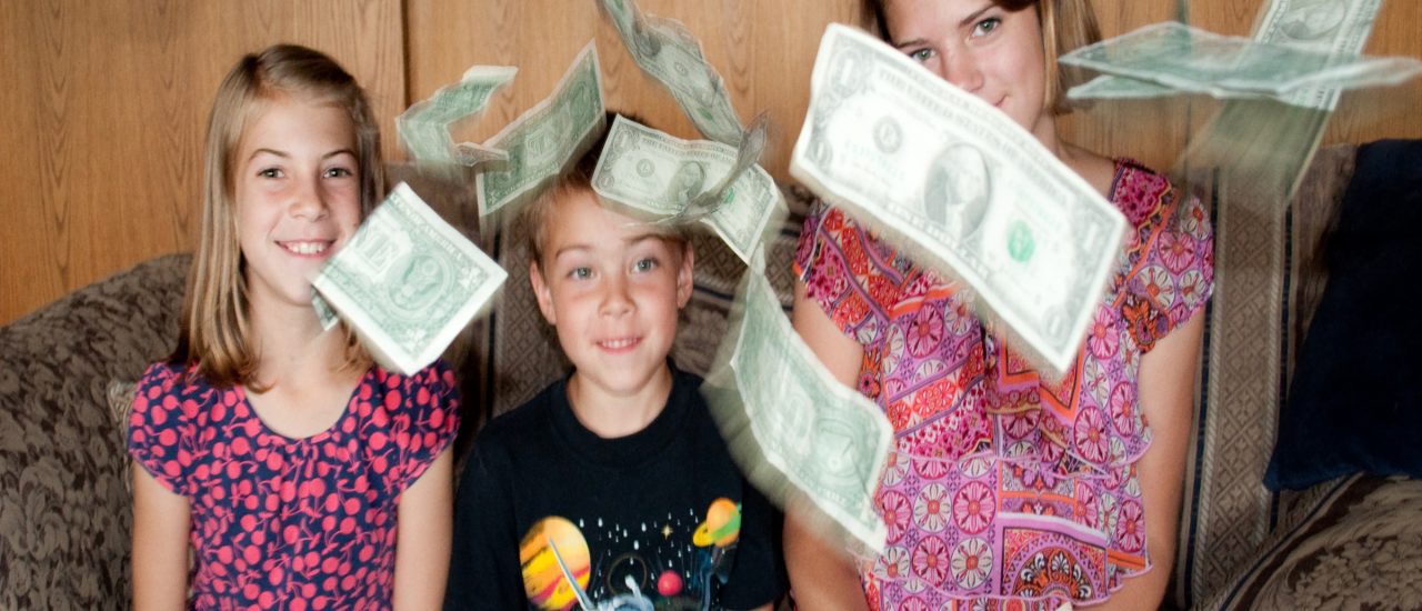 kids money dollar bills tossed