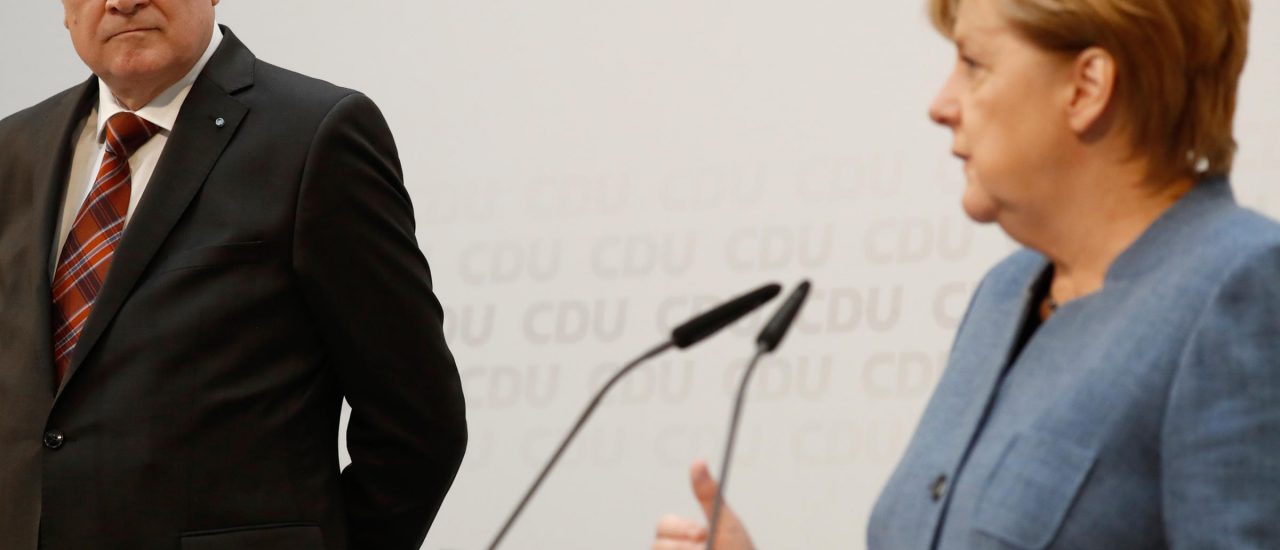 Horst Seehofer und Angela Merkel bei der Pressekonferenz zu den Unions-Verhandlungen. Foto: Odd Andersen | AFP