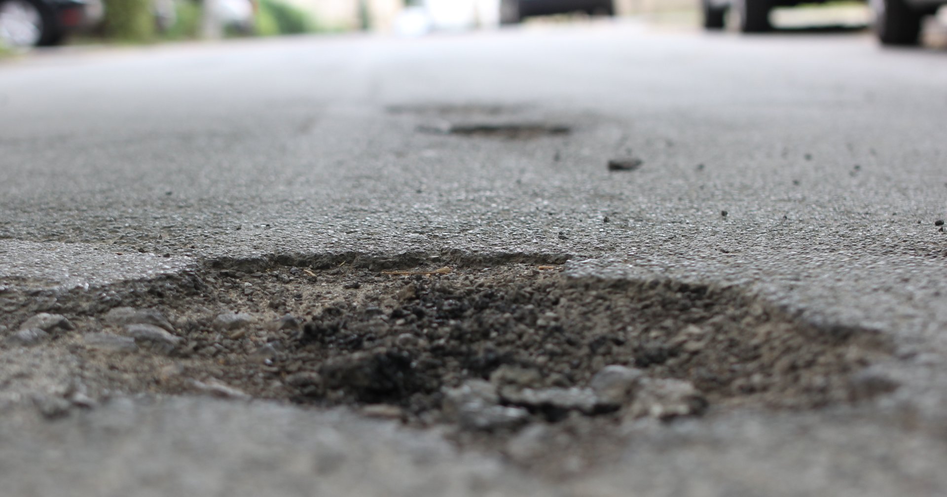 Damaged roads. Road Damage wet. Road surface Damage texture.