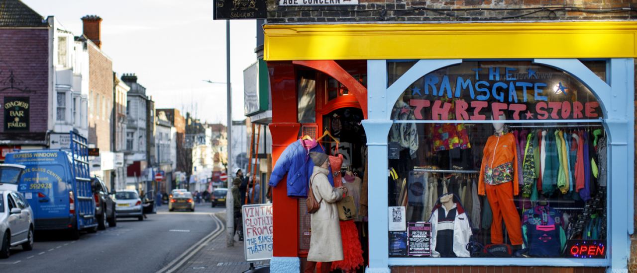 A woman enters a thrift store in Ramsgate, south east England on January 8, 2019. – In the Port of Ramsgate, dredging is under way to prepare the harbour for use in case of delays at the Port of Dover after March 29, the date the UK is set to leave the European Union. (Photo by Tolga Akmen / Tolga Akmen / AFP)