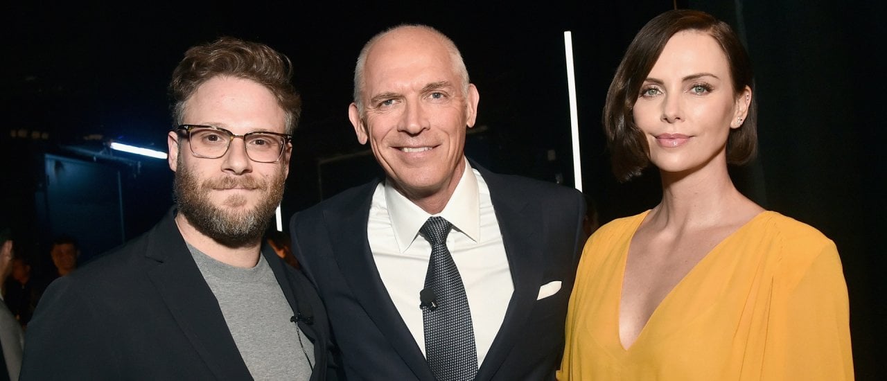 Seth Rogen, Lionsgate Chairman Motion Picture Group Joe Drake and Charlize Theron at CinemaCon 2019 Lionsgate Invites You to An Exclusive Presentation and Screening of ?Long Shot? at The Colosseum at Caesars Palace during CinemaCon, the official convention of the National Association of Theatre Owners, on April 4, 2019 in Las Vegas, Nevada. (Photo by Alberto E. Rodriguez / GETTY IMAGES NORTH AMERICA / AFP)