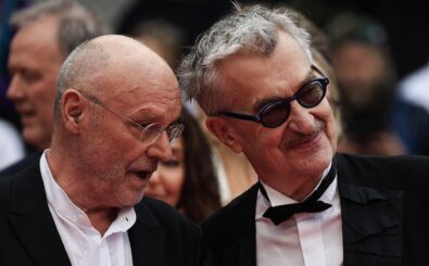 German artist Anselm Kiefer (L) and German director Wim Wenders arrive for the screening of the film „Anselm“ (Anselm – Das Rauschen der Zeit) during the 76th edition of the Cannes Film Festival in Cannes, southern France, on May 17, 2023. (Photo by Valery HACHE / AFP)