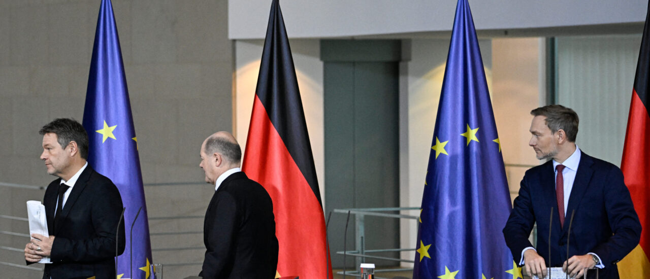 (L-R) German Minister of Economics and Climate Protection Robert Habeck German Chancellor Olaf Scholz and Finance Minister Christian Lindner leave after giving a statement on December 13, 2023 at the Chancellery in Berlin, after reaching a last-minute deal to end a budget deadlock. – German Chancellor Olaf Scholz’s coalition has reached a last-minute deal to end a budget deadlock, after a constitutional court ruling upended its spending plans and plunged it into a crisis. (Photo by Tobias SCHWARZ / AFP)