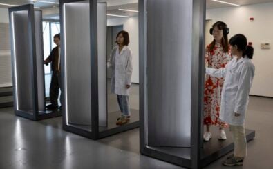 Visitors take part in an interactive artwork by Serbian conceptual artist Marina Abramovic on the opening day of her first exhibition in China – titled „Transforming Energy- in Shanghai on October 11, 2024. (Photo by AFP) / China OUT / CHINA OUT