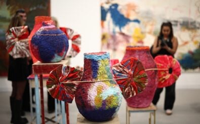 Guests look at works from the series ‚Monuments‘ by Studio Lenca at the Carl Freedman Gallery at the Frieze London 2025 exhibition in London on October 15, 2025. (Photo by HENRY NICHOLLS / AFP) / RESTRICTED TO EDITORIAL USE – MANDATORY MENTION OF THE ARTIST UPON PUBLICATION – TO ILLUSTRATE THE EVENT AS SPECIFIED IN THE CAPTION