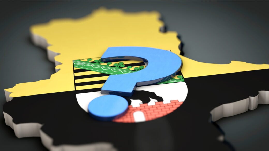Eine 3D-Darstellung von Sachsen-Anhalt mit dem landeswappen und einem Fragezeichen in der Mitte. Foto: Shutterstock, DesignRage